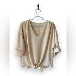 Maurices, size medium, cream colored flowy top with lace trim & front tie